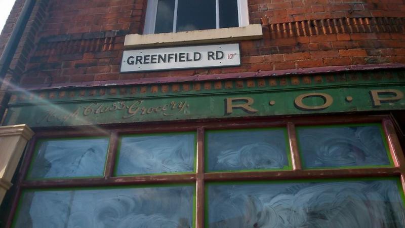 Close up of the R O Price grocer's shop sign