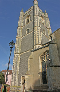 The tower of Dedham's church. It's grey (probably the flint) with beige stone detail.